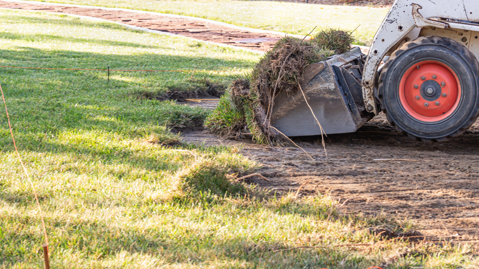 A tractor that is sitting in the dirt